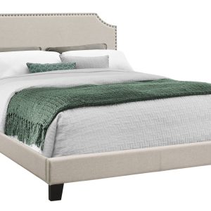 Beige Standard Bed Upholstered With Nailhead Trim And With Headboard