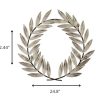 Distressed White Metal Wreath Wall Decor - Image 4