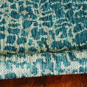 5' x 8'  Teal Animal Print Outdoor Area Rug