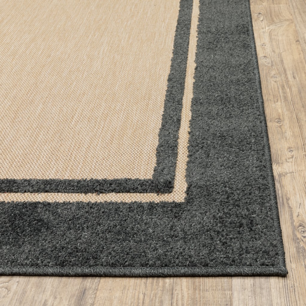 6' x 9' Sand and Black Border Indoor Outdoor Area Rug - Image 3