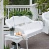 White Resin Wicker Porch Swing with Hanging Hooks Springs and Blue Cushion - Image 2